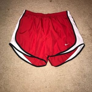 Red Nike shorts